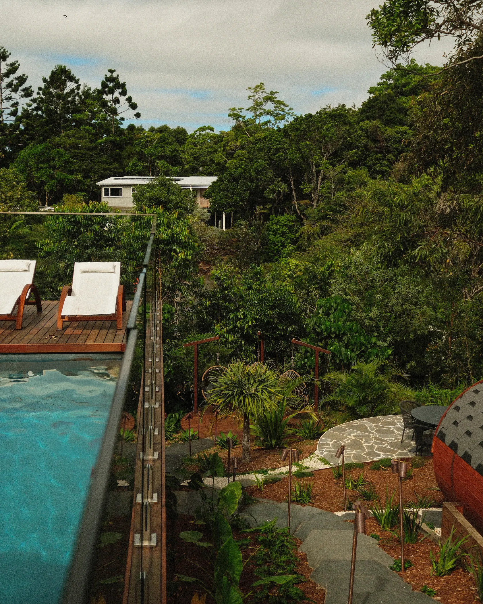 A pool and deck looking out over the valley